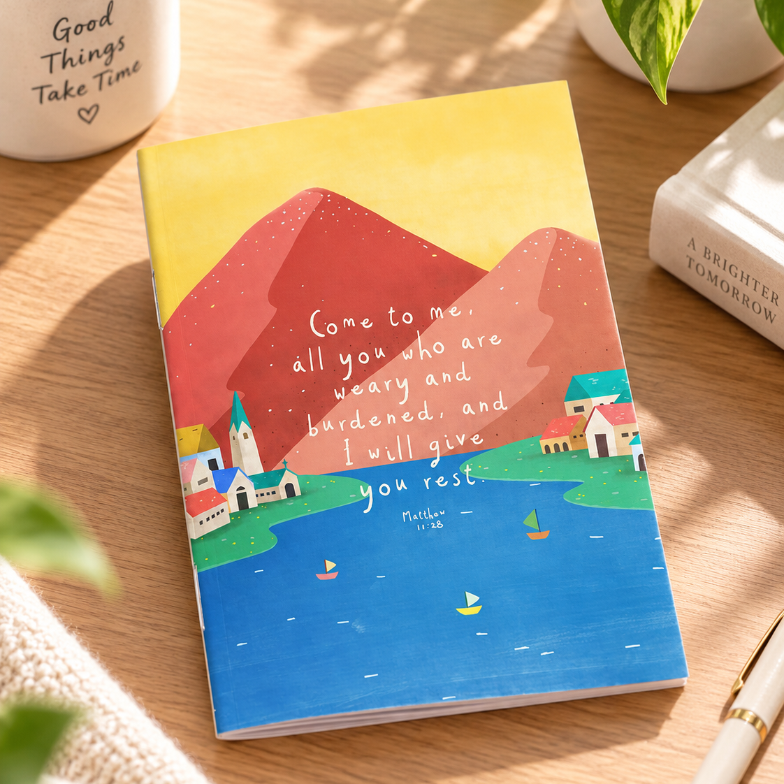 Come To Me and I Will Give You Rest Matthew 11:28 A6 Christian notebook styled on a bright wooden desk