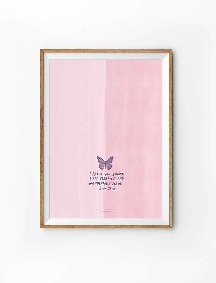 Minimalist Christian wall art featuring a soft pink watercolor background with a purple butterfly illustration and the Bible verse Psalm 139:14, which reads, 'I praise you because I am fearfully and wonderfully made.' This faith-inspired decor is perfect for homes or as meaningful Christian gifts in Singapore.