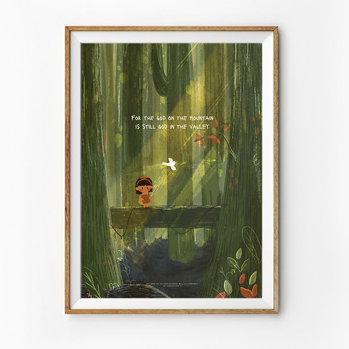 A framed Christian art print featuring a child standing on a wooden bridge in a lush, green forest. The text on the artwork reads, 'For the God on the mountain is still God in the valley,' conveying a message of faith and reassurance.