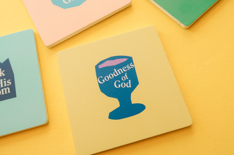 Faithful Geometric Decor: Vibrant wooden square coasters with Christian patterns.