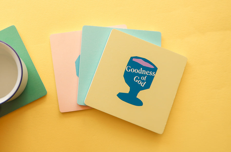 Christian Coaster Duo: Colorful wooden square coasters featuring simple geometry.