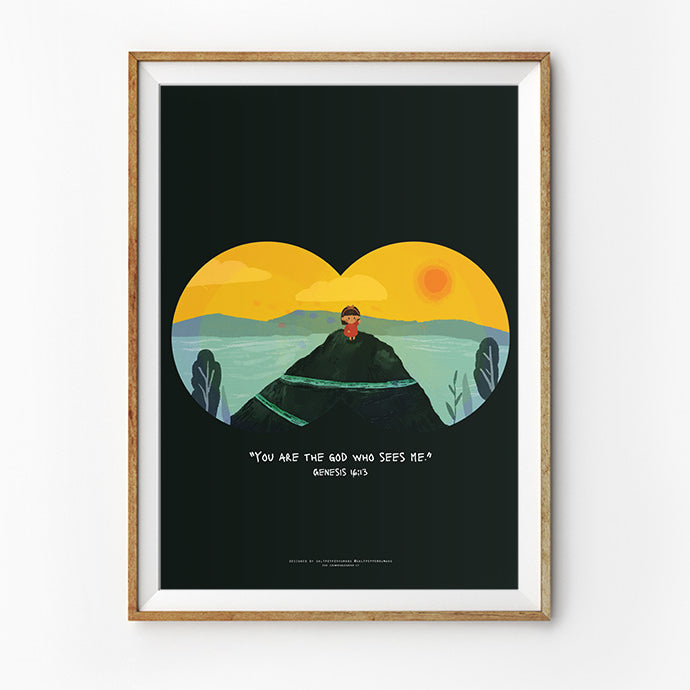 A framed Christian art print featuring a child standing on a mountain peak, viewed through a lens-like frame against a dark background. The Bible verse from Genesis 16:13 reads, 'You are the God who sees me,' symbolizing God's watchful presence.