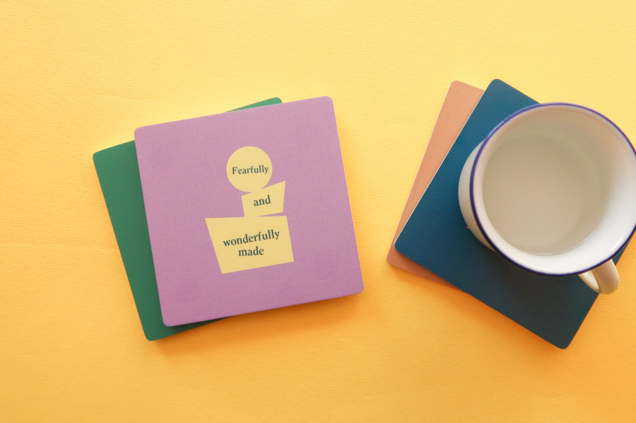 Divine Design Coaster: Colorful square wooden coaster featuring Christian motifs