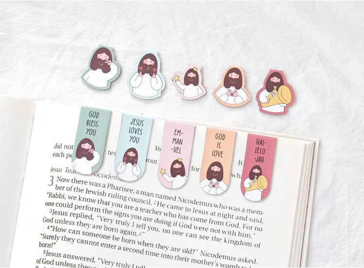 Assorted Christian magnetic bookmarks with colourful faith-inspired designs.