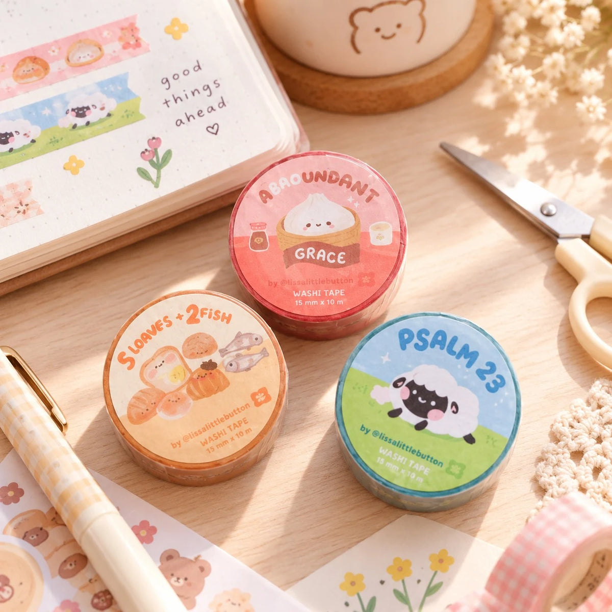 Abundance Christian washi tape rolls beside a journal