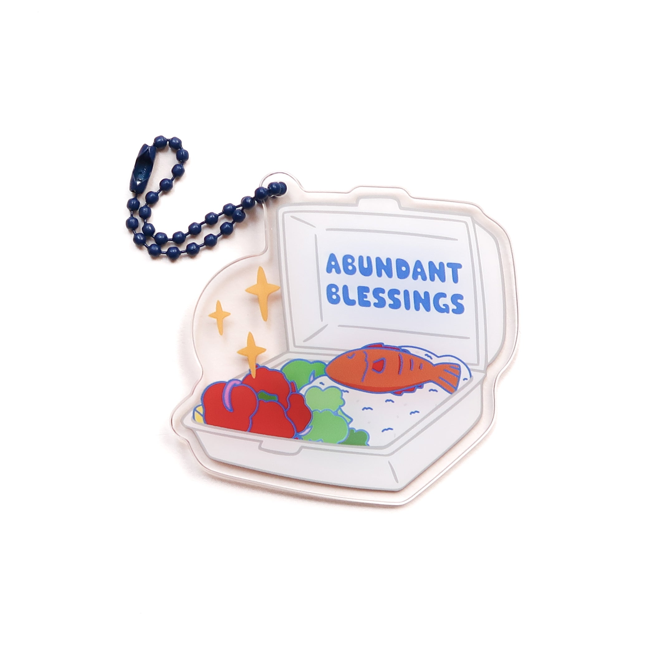 Acrylic keychain featuring a "cai png" design with "Abundant Blessings" message, from The Commandment Co, Singapore.