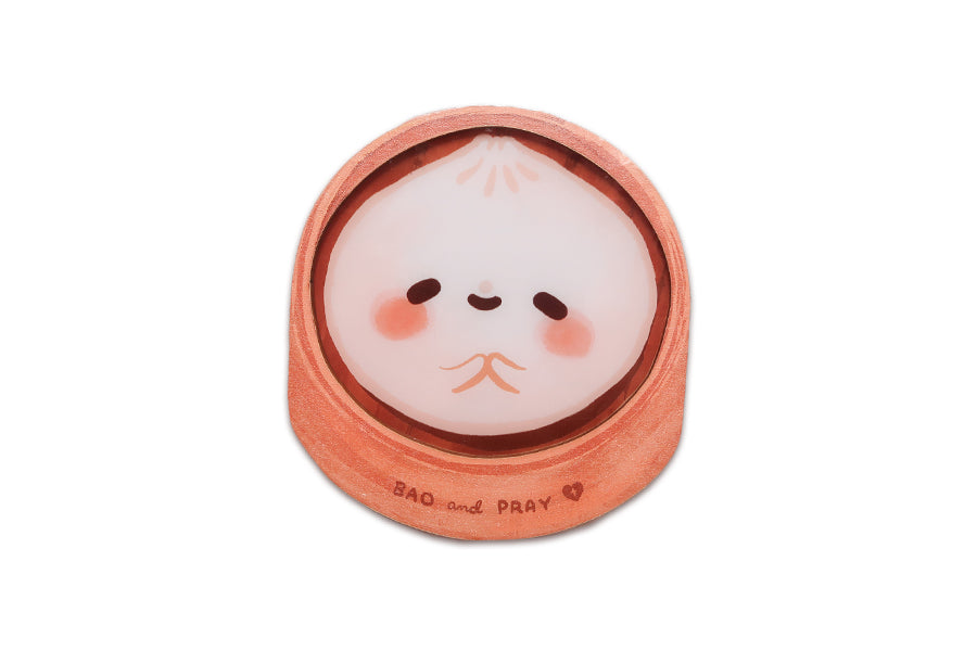 Christian bao coaster with cute dim sum illustration and “Bao and Pray” text in warm peach tones.