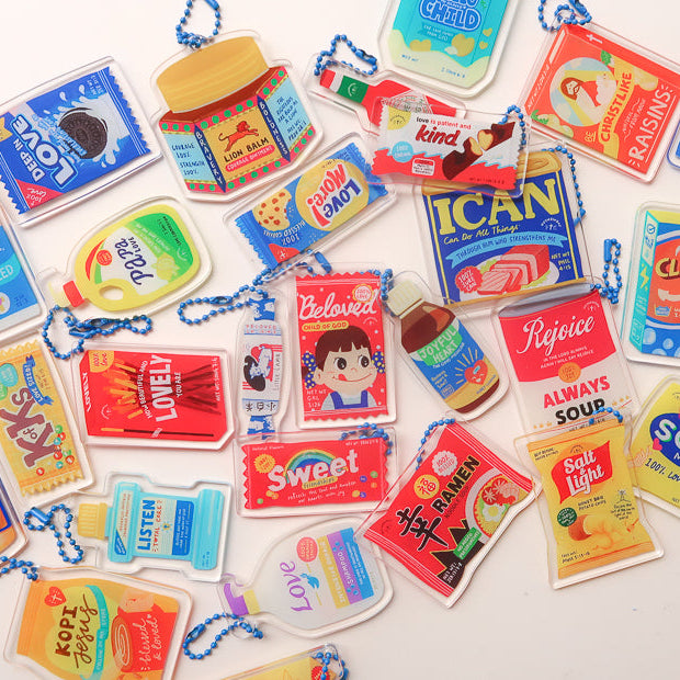 Assorted playful Love Supermarket acrylic keychains.