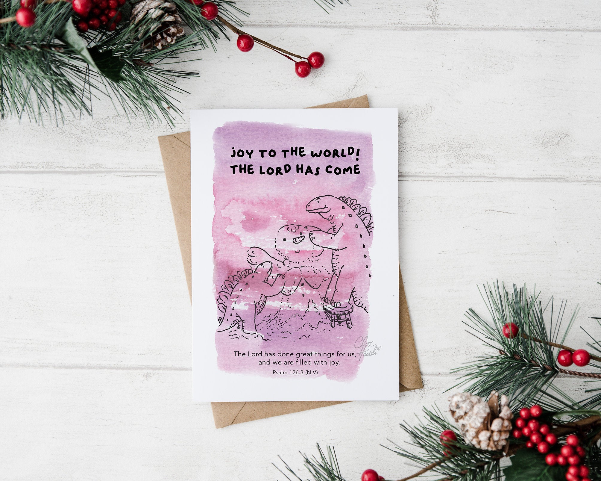 ChezHemdi A6 dino postcard with ‘Joy to the World, The Lord Has Come’ verse – Christian Christmas card from The Commandment Co