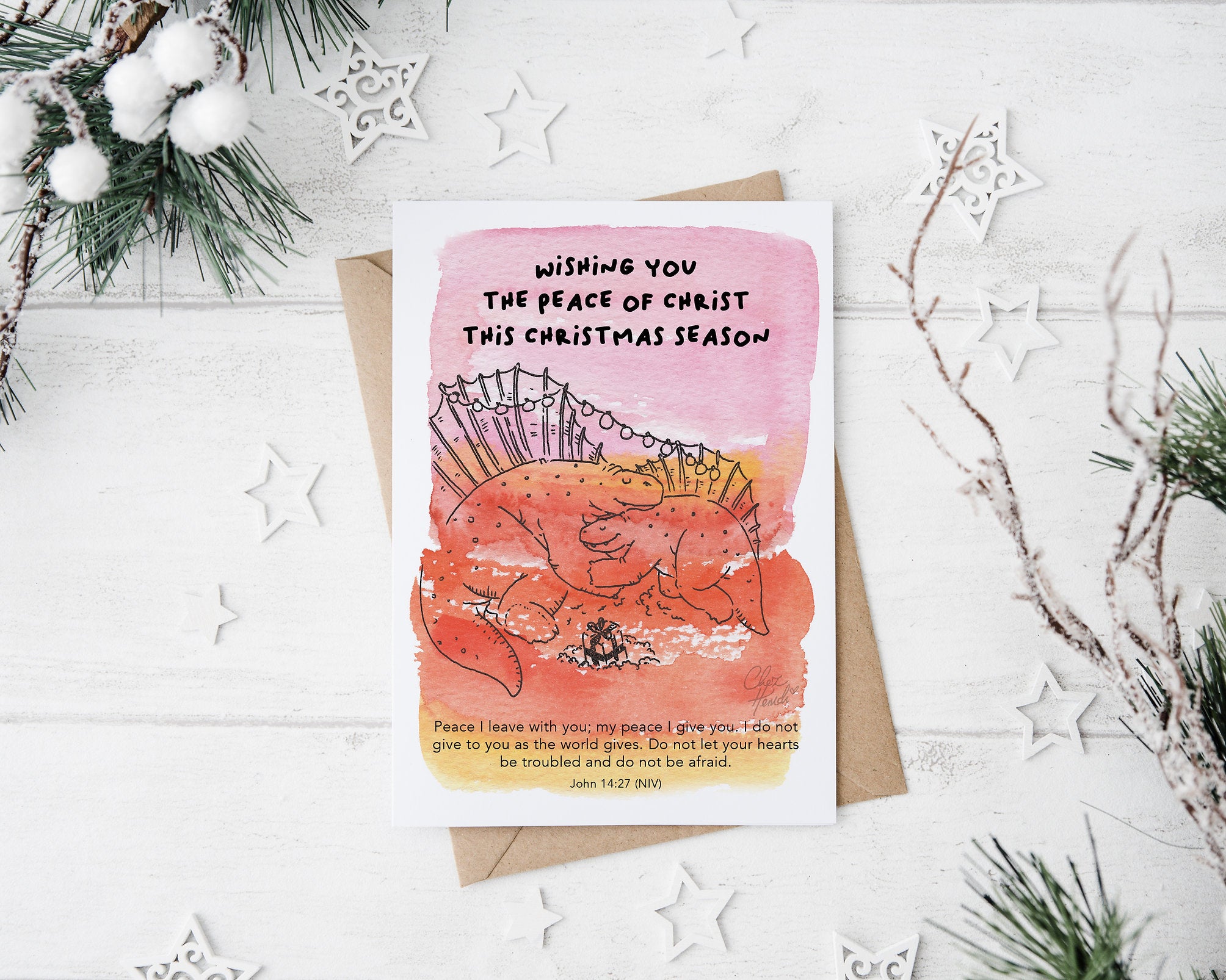 ChezHemdi A6 dino postcard with ‘Wishing You the Peace of Christ This Christmas Season’ verse – Christian Christmas card from The Commandment Co