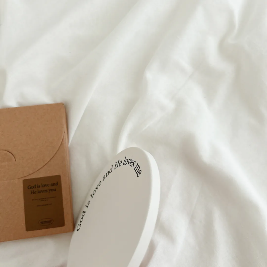 Side view of Christian ceramic coaster