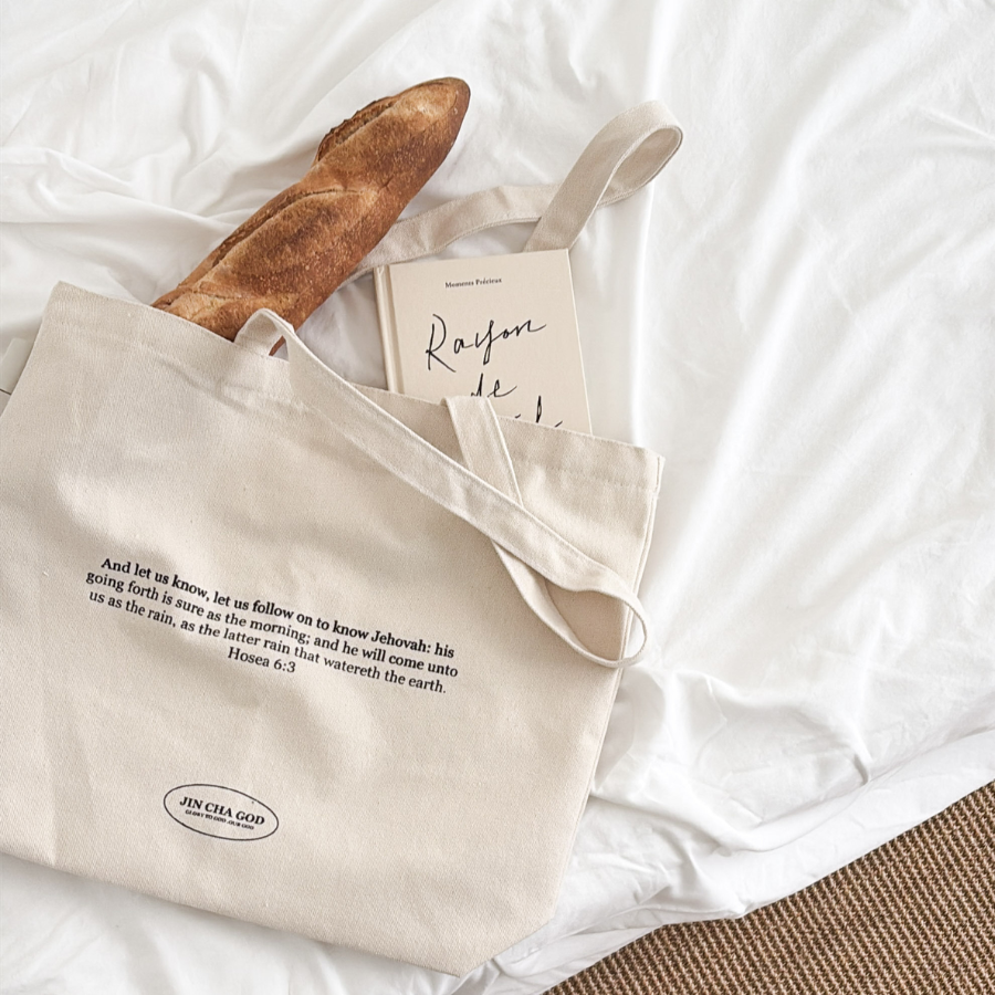 God is like warm sunshine Christian canvas tote bag with Hosea 6:3 Bible verse in English