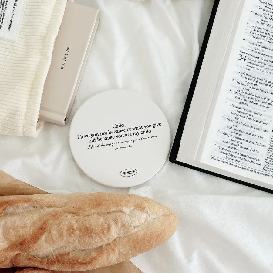 Front view of Christian ceramic coaster with "Child, I love you" Bible-inspired message in elegant script