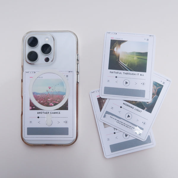 Faith scratch card displayed at the back of a phone as a daily reminder