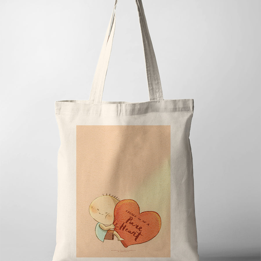 Christian tote bag featuring a cute character hugging a heart with the words “Create in me a pure heart,” inspired by Psalm 51:10
