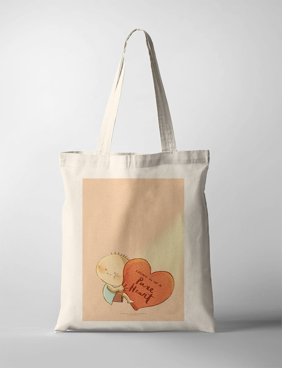 Christian tote bag featuring a cute character hugging a heart with the words “Create in me a pure heart,” inspired by Psalm 51:10