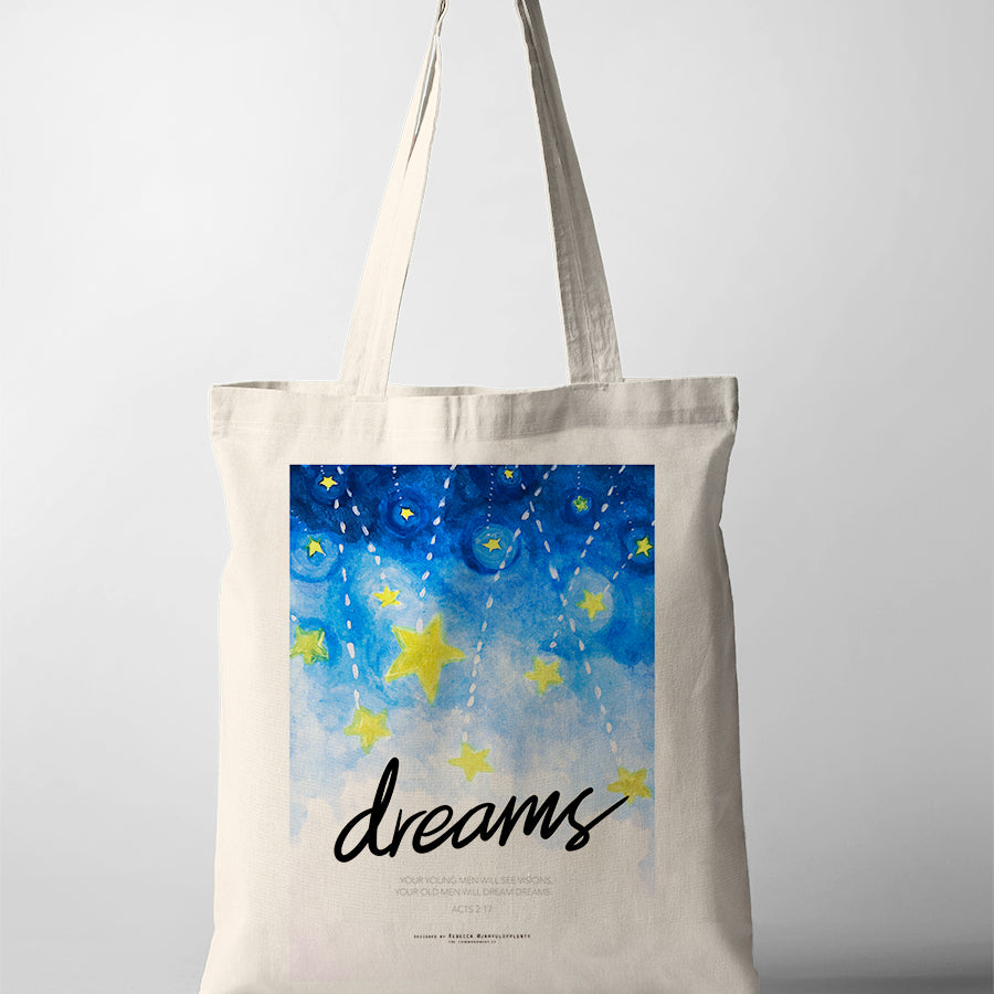 Faith-based tote bag with blue sky and yellow star artwork inspired by Acts 2:17 — your young men will see visions, your old men will dream dreams.