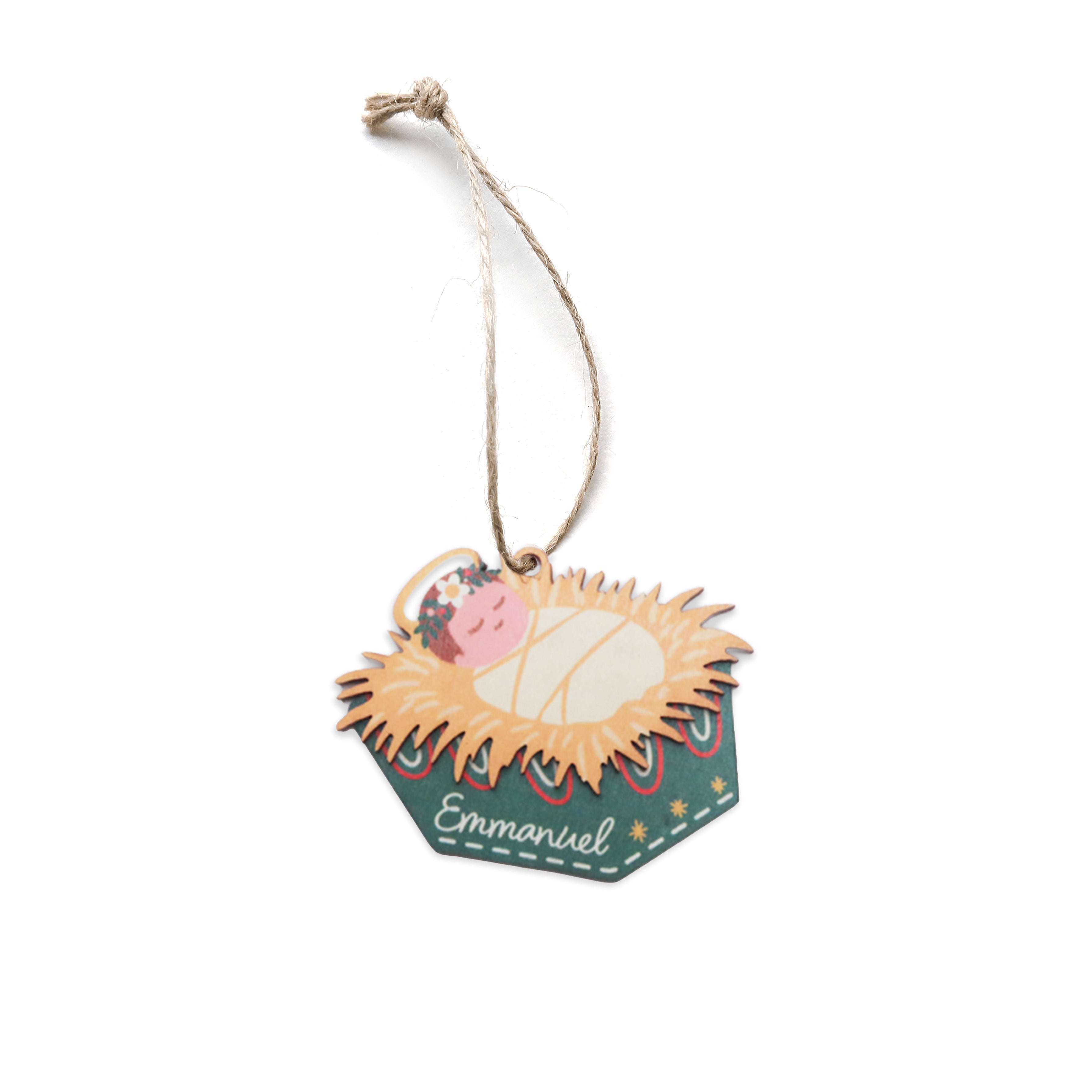 Baby Jesus in a manger Christmas bauble with the word ‘Emmanuel’.