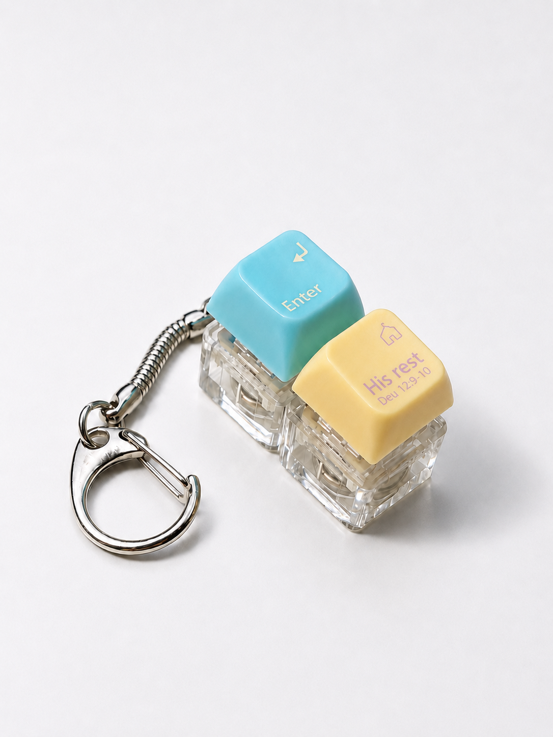 Enter His Rest double light-up keycap keychain with blue and yellow keys on a white background