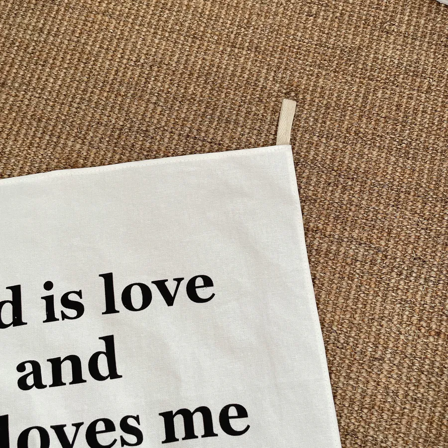 Close-up of tapestry hanging loops for easy wall display