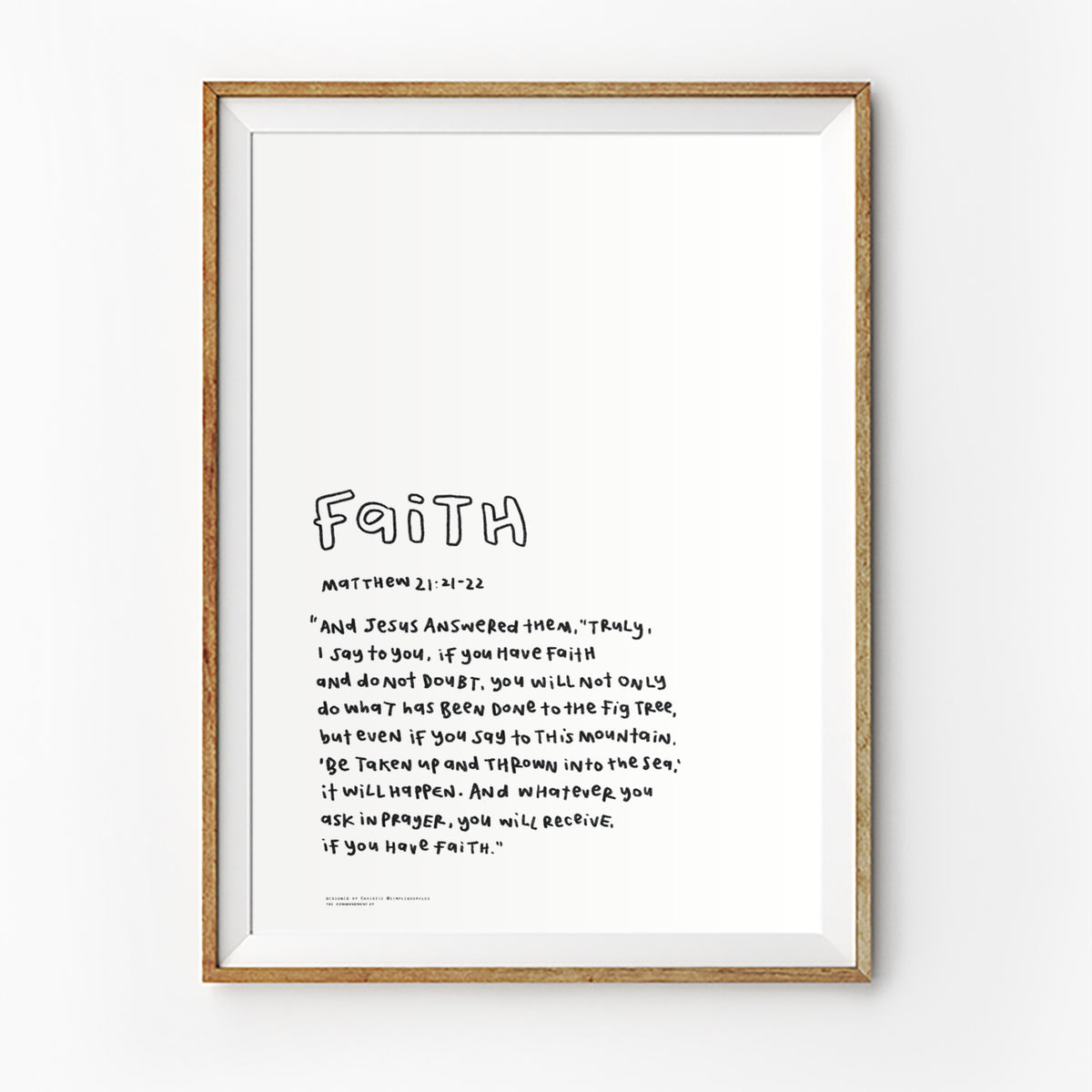 Faith Bible verse poster featuring Matthew 21:21-22 in a simple handwritten style, displayed in a framed wall art mockup.