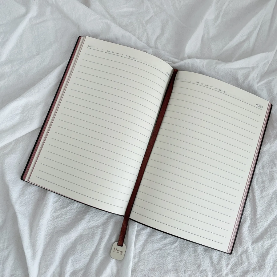 Interior view of the Christian faith journal with lined pages for writing and reflection