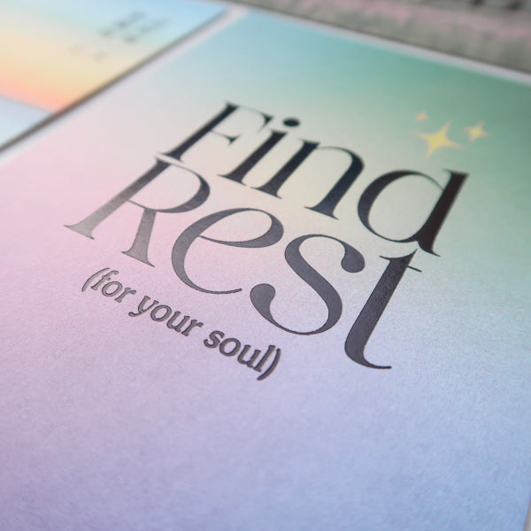 A detailed view of a postcard with a soft gradient background and the encouraging message "Find Rest (for your soul)," designed to promote peace and relaxation.