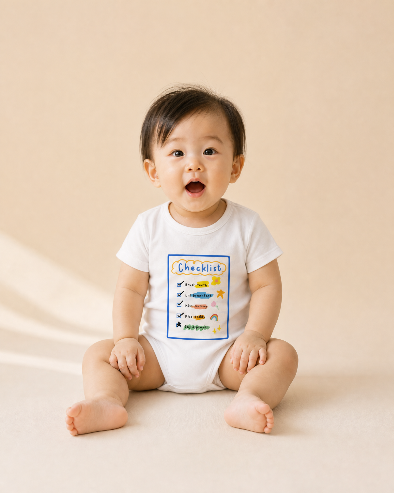 Baby wearing the Checklist Christian romper with colourful faith-based design