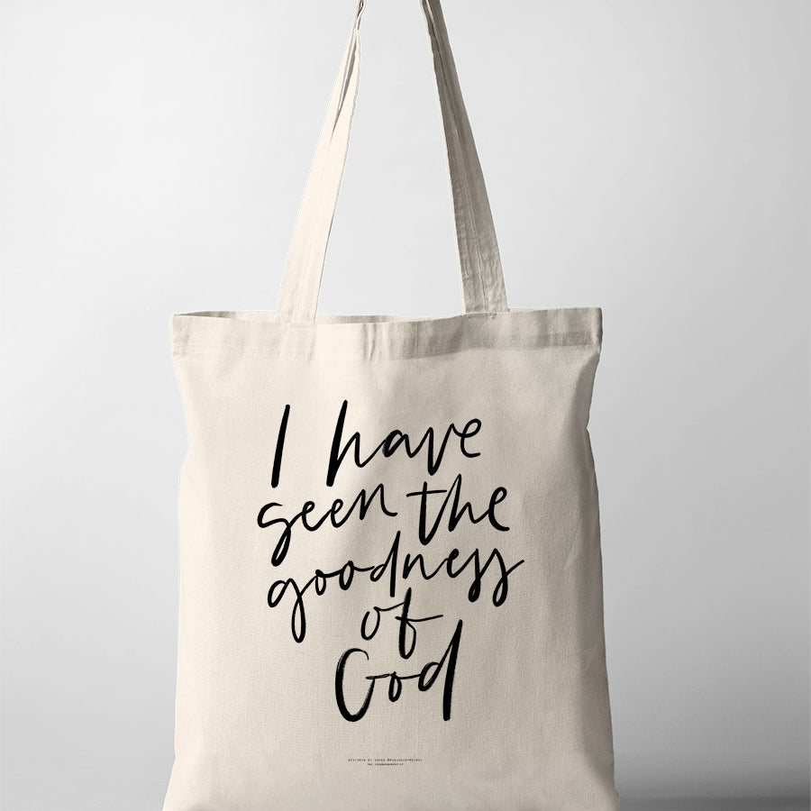 Beige tote bag with the words 'I have seen the goodness of God' printed in black handwritten-style script on the front."