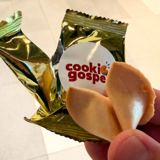 Opened Gospel Cookie revealing Bible verse message inside fortune cookie