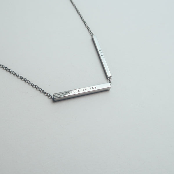 Personalised Hidden Message bar necklace lifestyle view.