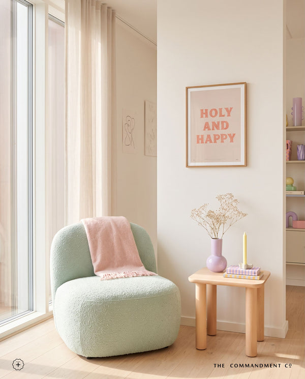 Holy and Happy Christian poster styled in a soft pastel reading corner