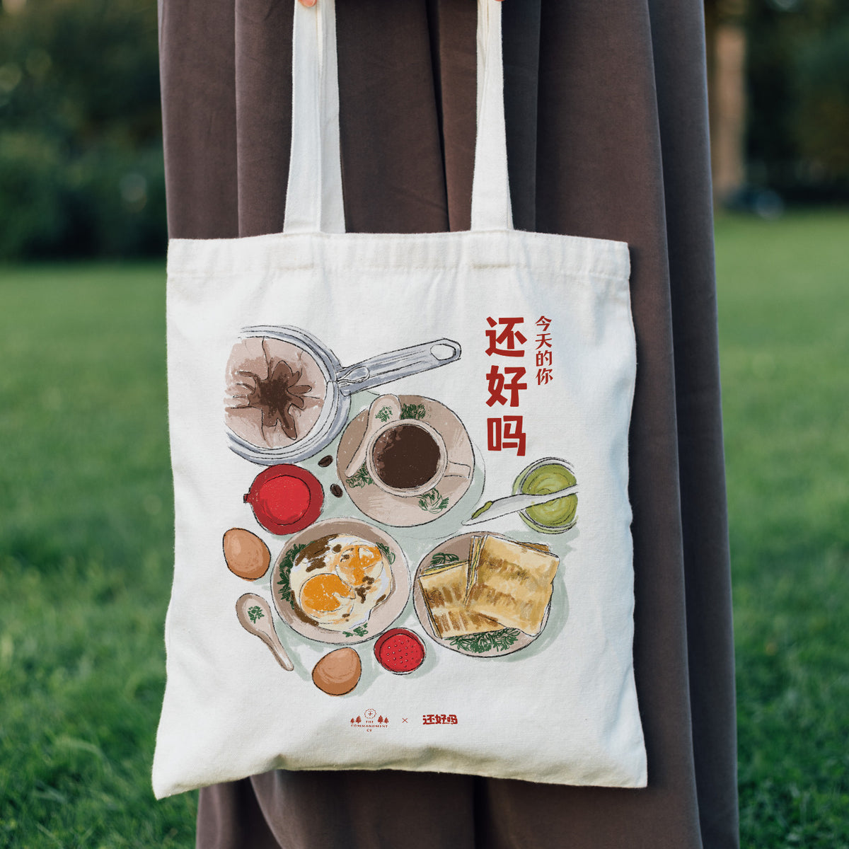 Person carrying the How Are You Today Chinese breakfast tote bag outdoors