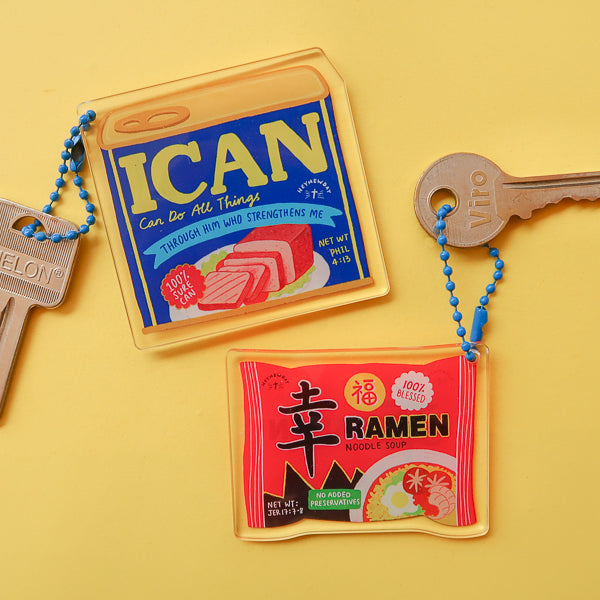 Love Supermarket Christian acrylic keychains shown together.