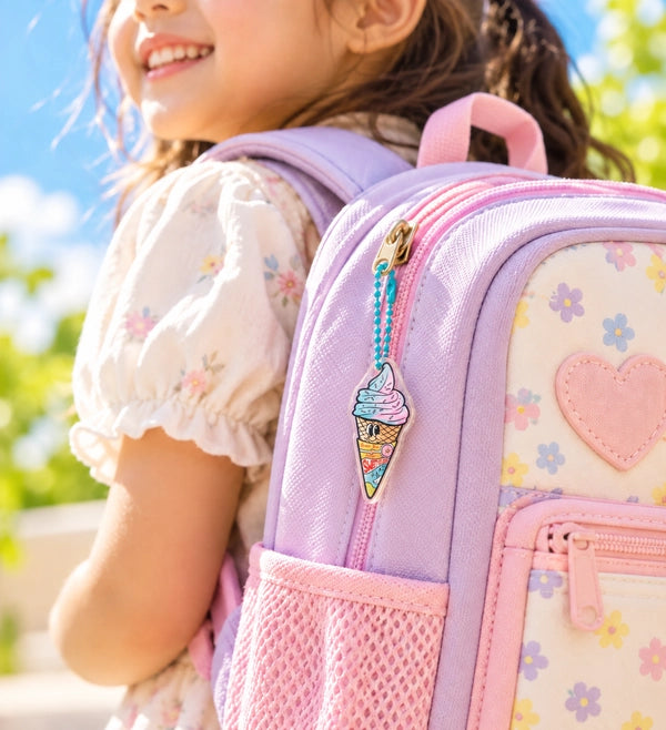 Sweeter than Honey ice cream acrylic keychain on pastel school backpack