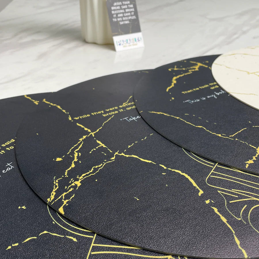 Faith-inspired round dining mats featuring Jesus and scripture for sacred table settings