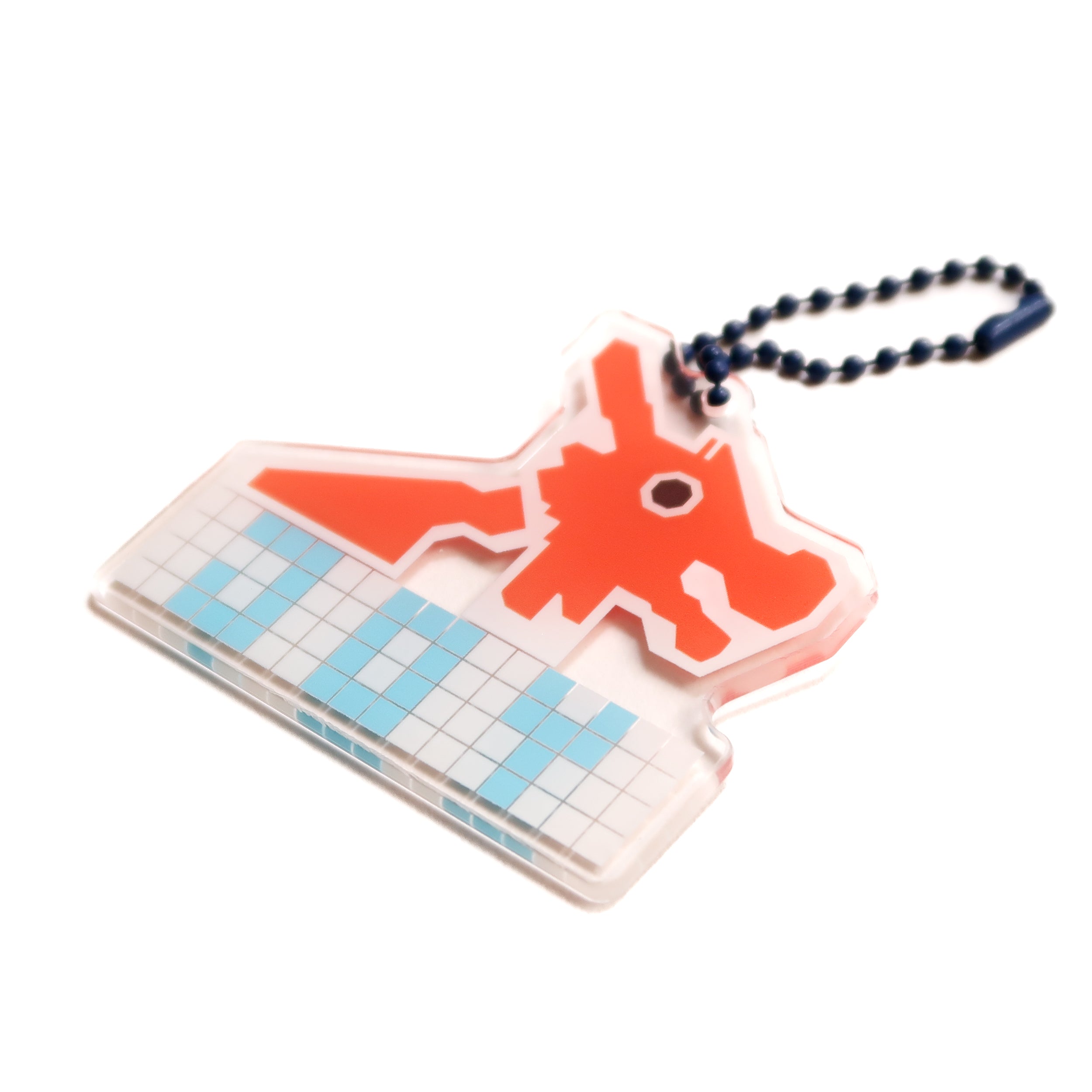 Acrylic keychain with a dragon mosaic design and the word "Joy," from The Commandment Co, Singapore.