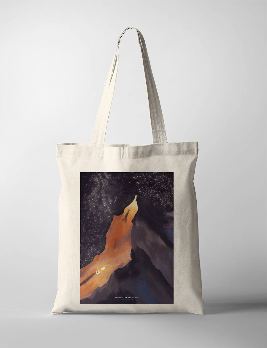 Light in the Darkness tote bag featuring a mountain and starry night design, Christian inspirational accessory from The Commandment Co, Singapore