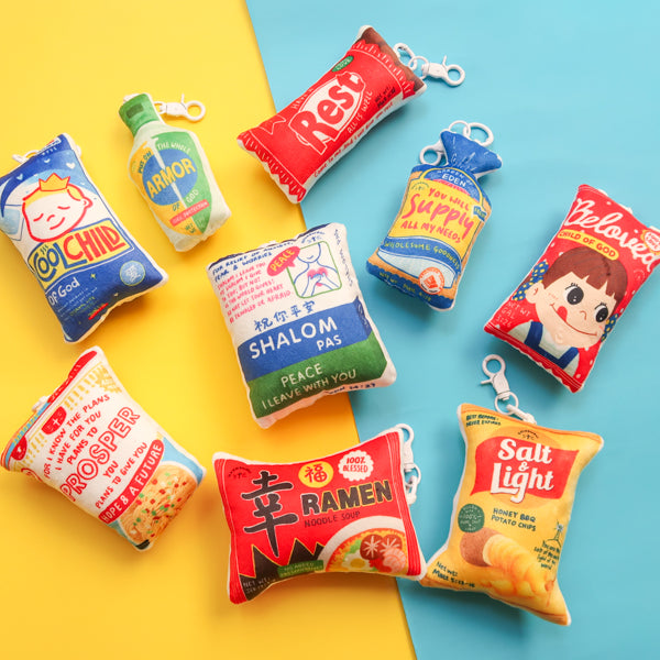 Love Supermarket plushie keychain collection featuring Blessed Ramen and other snack-inspired designs