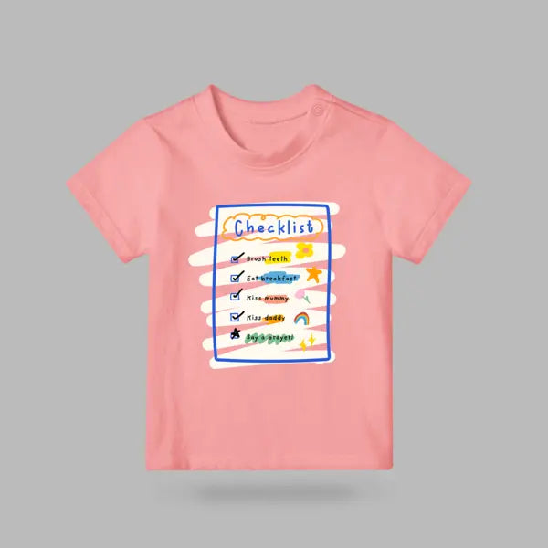 Pink kids T-shirt featuring a colourful My Daily Checklist design with morning routines and prayer