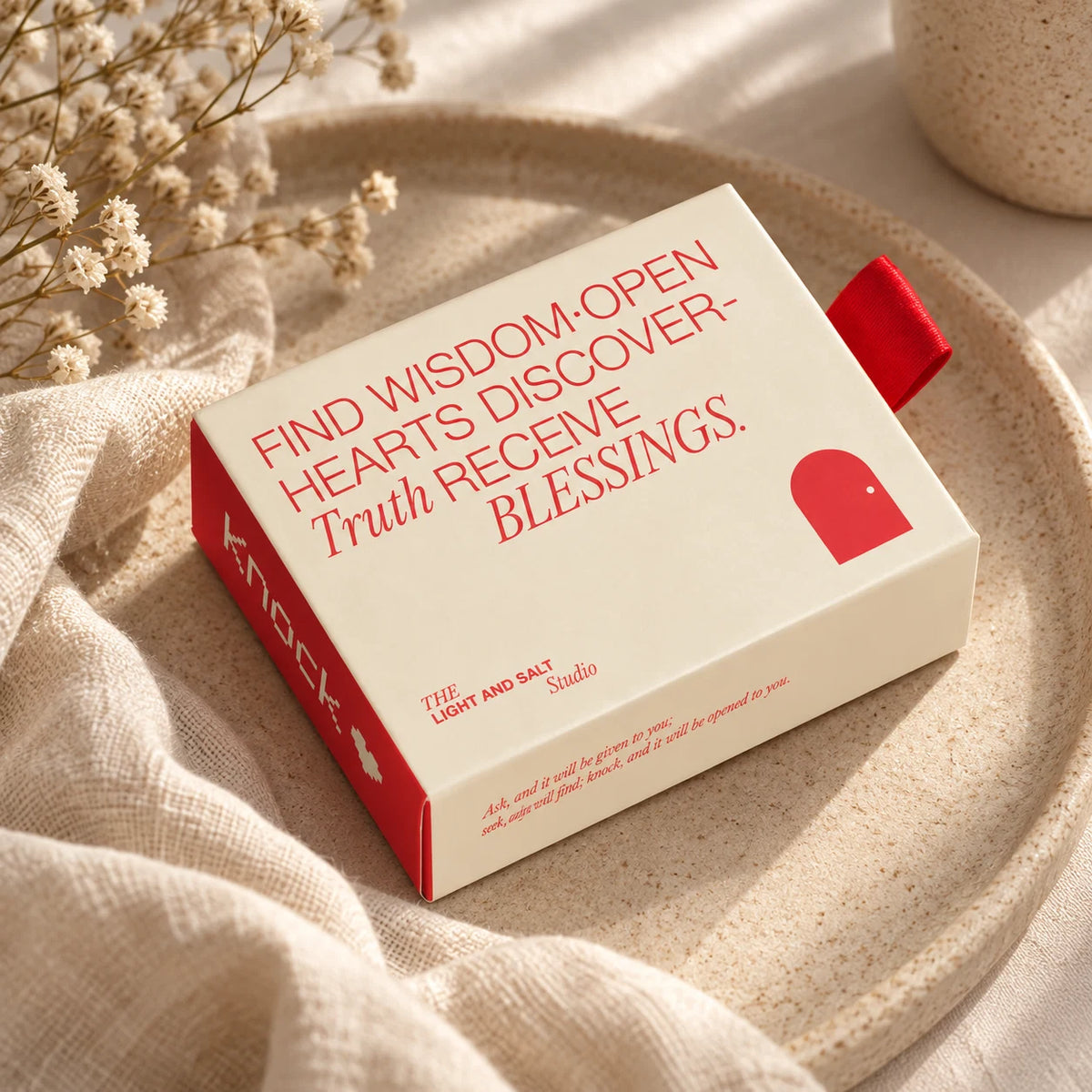 Open Hearts Faith Edition Mandarin conversation card set styled on a neutral tray in warm natural light.