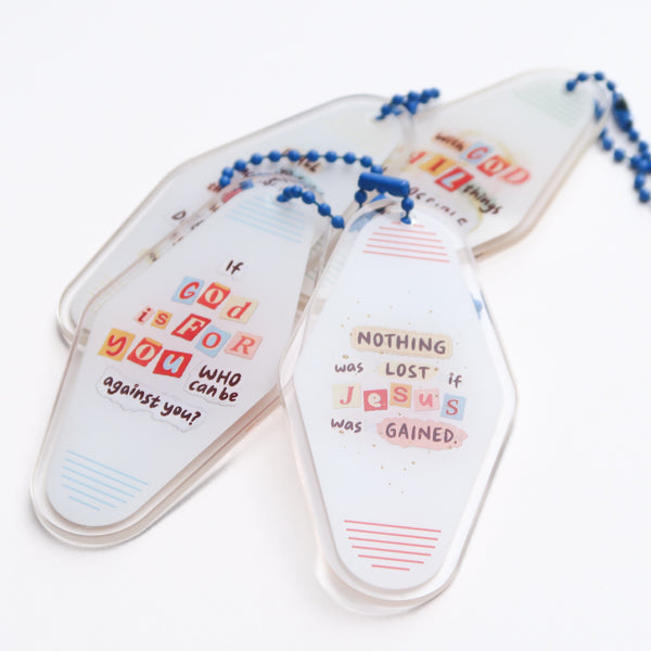 Christian acrylic keychain set with encouraging faith messages, including “Nothing was lost if Jesus was gained,” from the Void to Light collaboration.