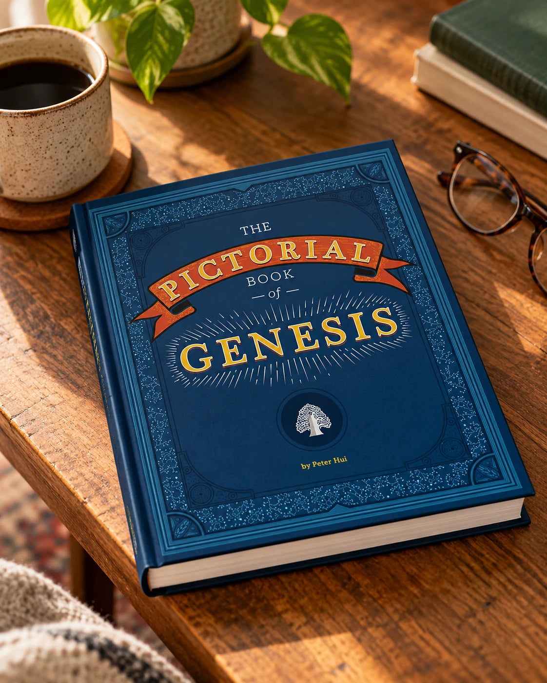 Pictorial Book of Genesis hardcover on wooden coffee table