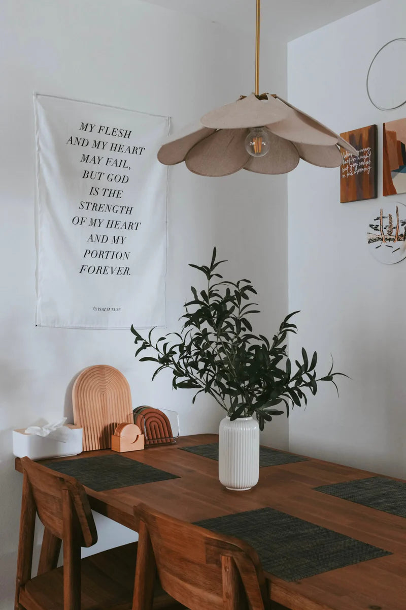 Project J wall tapestry with Psalm 73:26 scripture displayed in a cozy dining room, inspiring faith, simple happiness, and uplifting home decor.