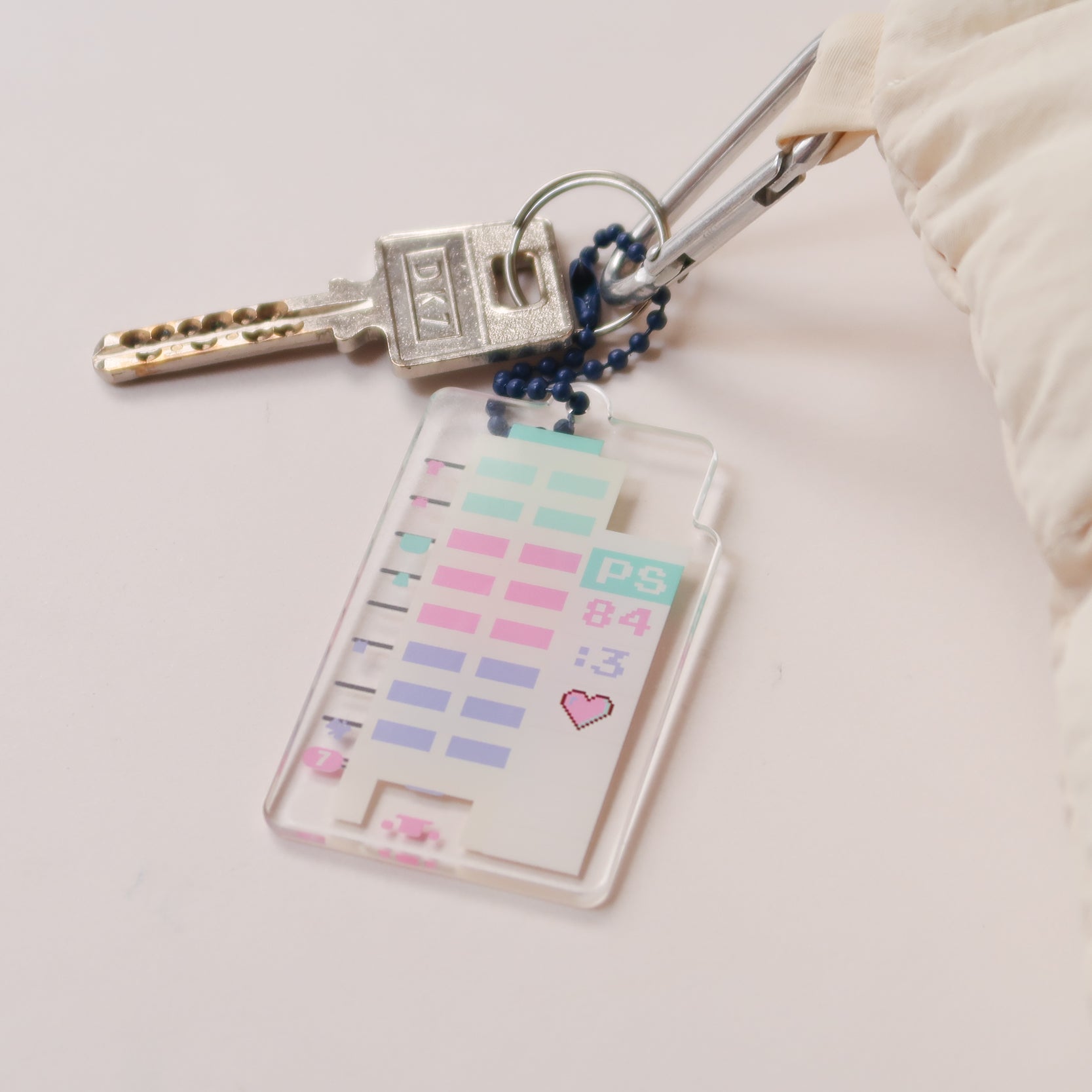 Acrylic keychain with HDB design and Psalm 84:3, attached to a keyring, from The Commandment Co, Singapore.