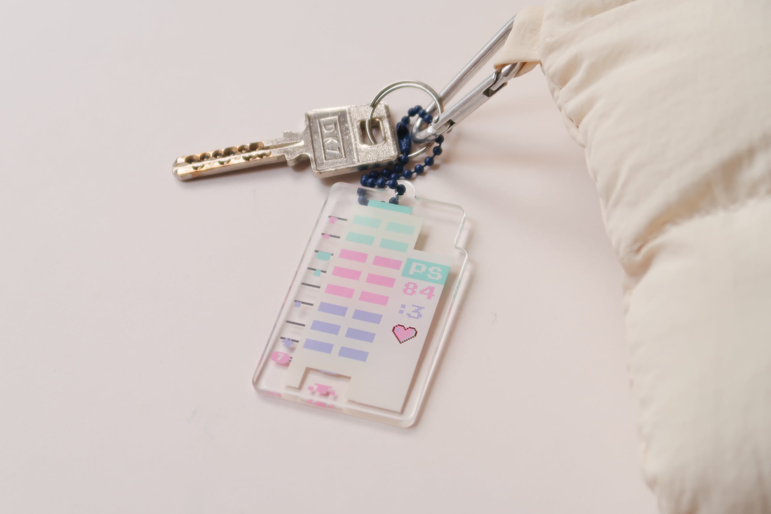 Acrylic keychain with HDB design and Psalm 84:3, attached to a keyring, from The Commandment Co, Singapore.