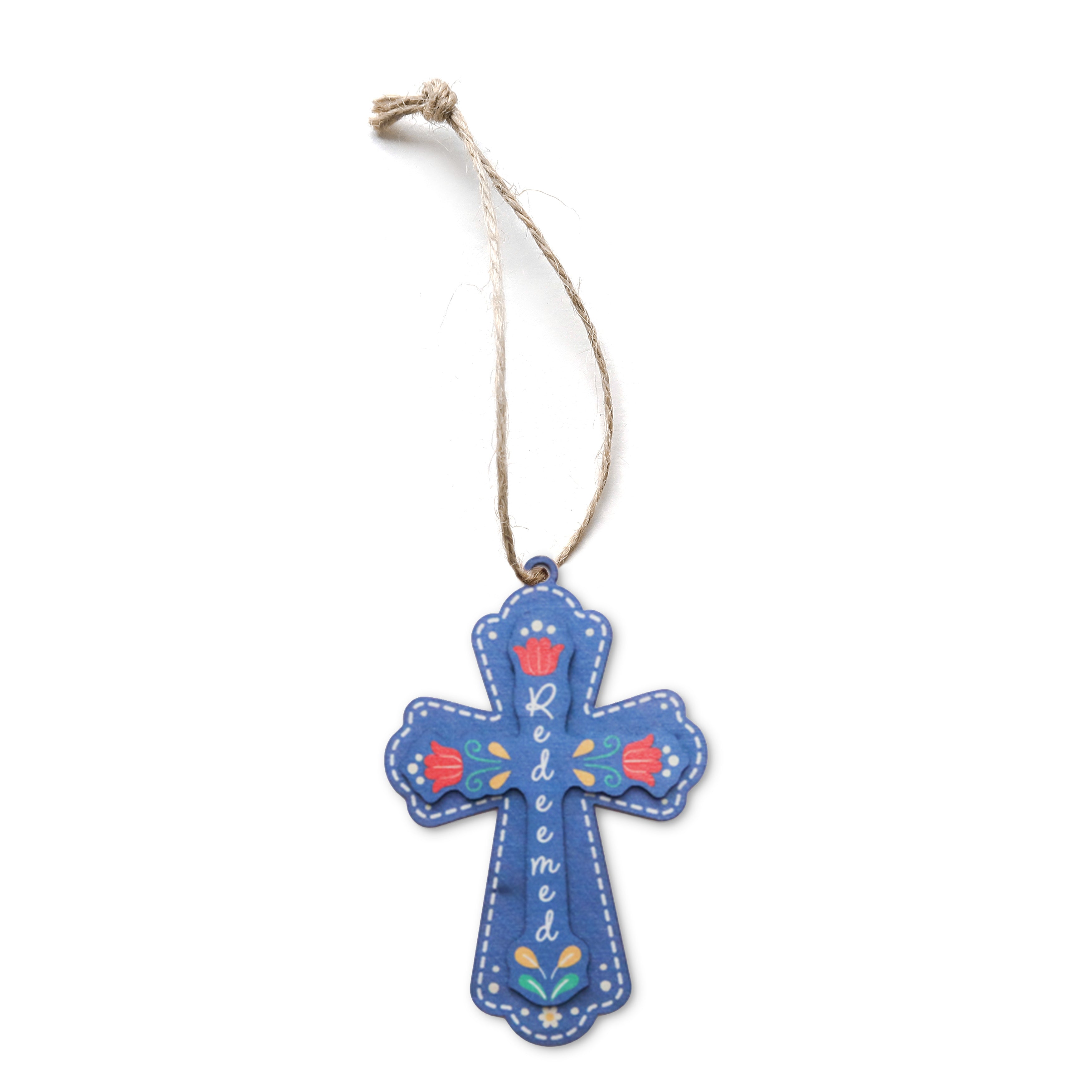 Blue cross-shaped Christmas bauble with floral details and the word ‘Redeemed
