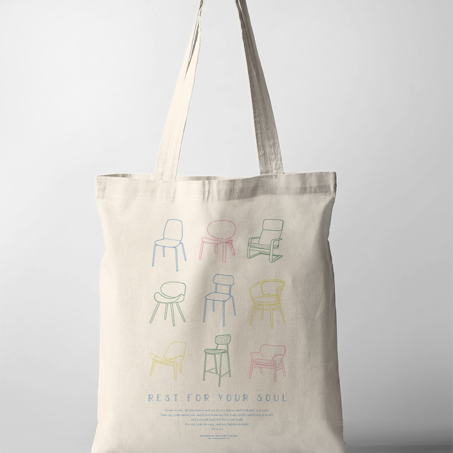 Neutral canvas tote bag featuring colorful line drawings of chairs and the uplifting phrase "Rest for your soul," inspiring simple happiness and peaceful, faith-filled living.