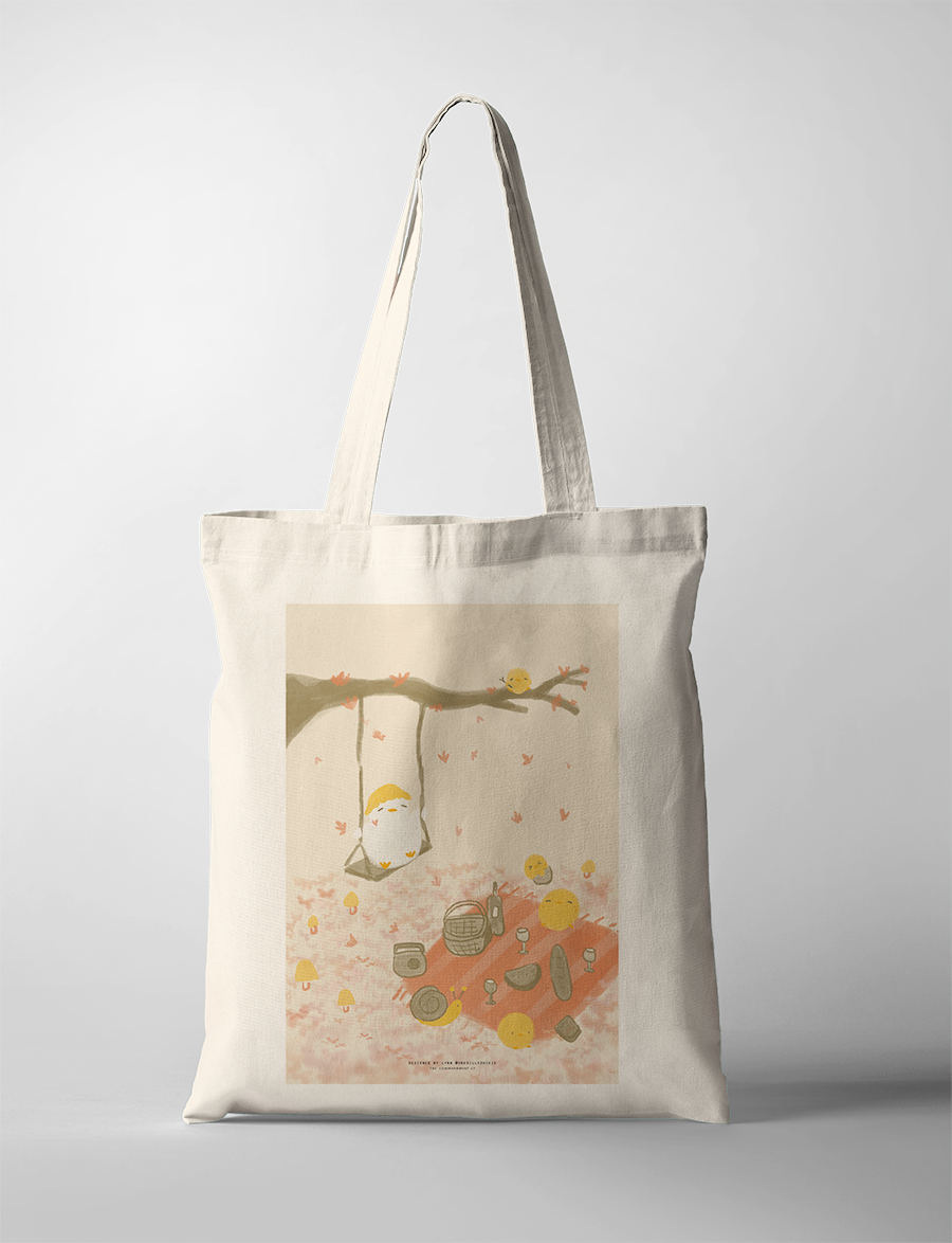 Rest for Your Soul tote bag featuring a peaceful picnic scene with a swing, Christian inspirational accessory from The Commandment Co, Singapore