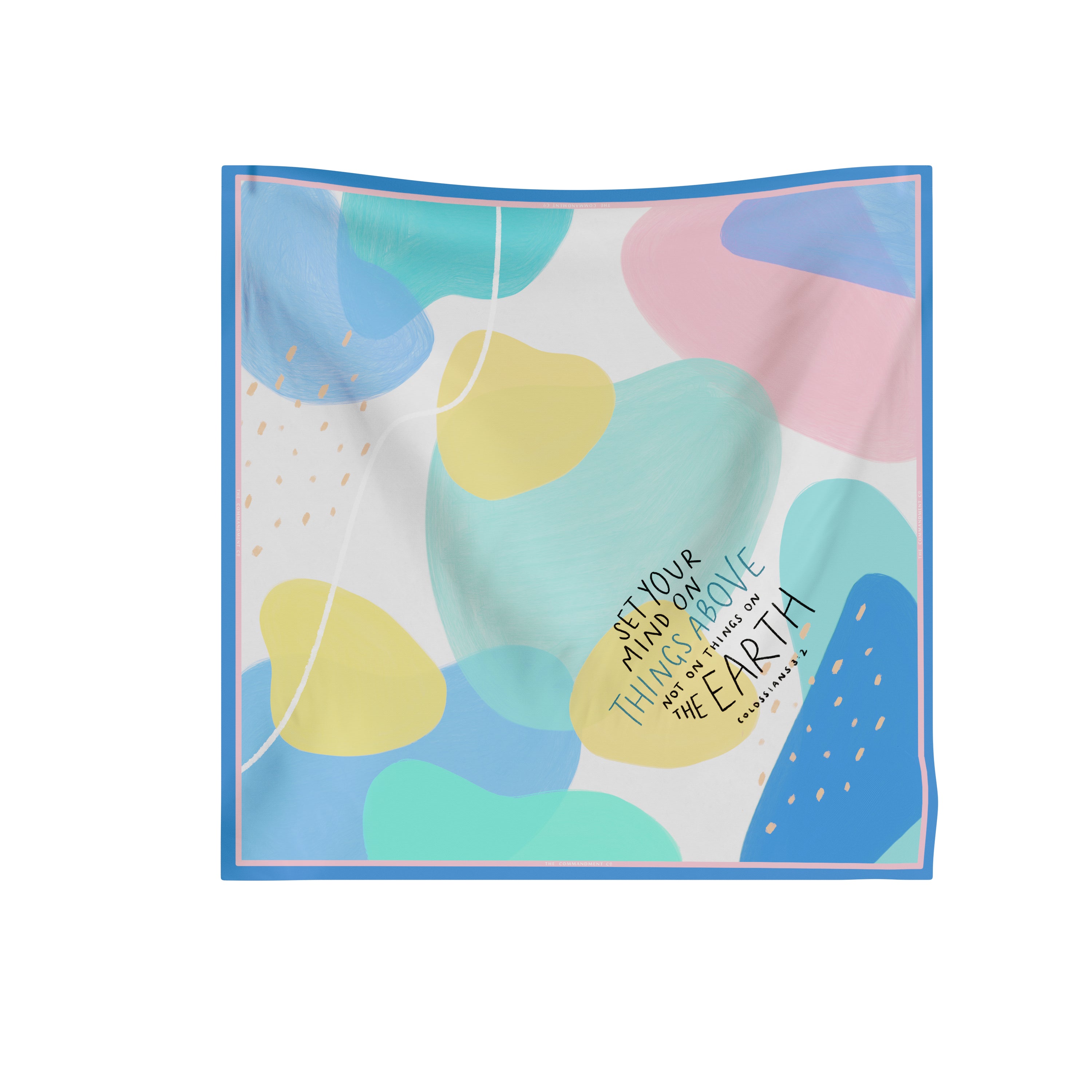 Colorful abstract scarf featuring the Colossians 3:2 verse “Set your mind on things above” in a modern Christian design by The Commandment Co.